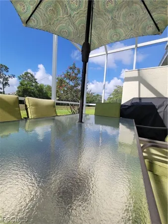 a view of swimming pool with a back yard