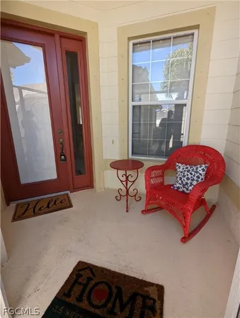 a bedroom with furniture and window