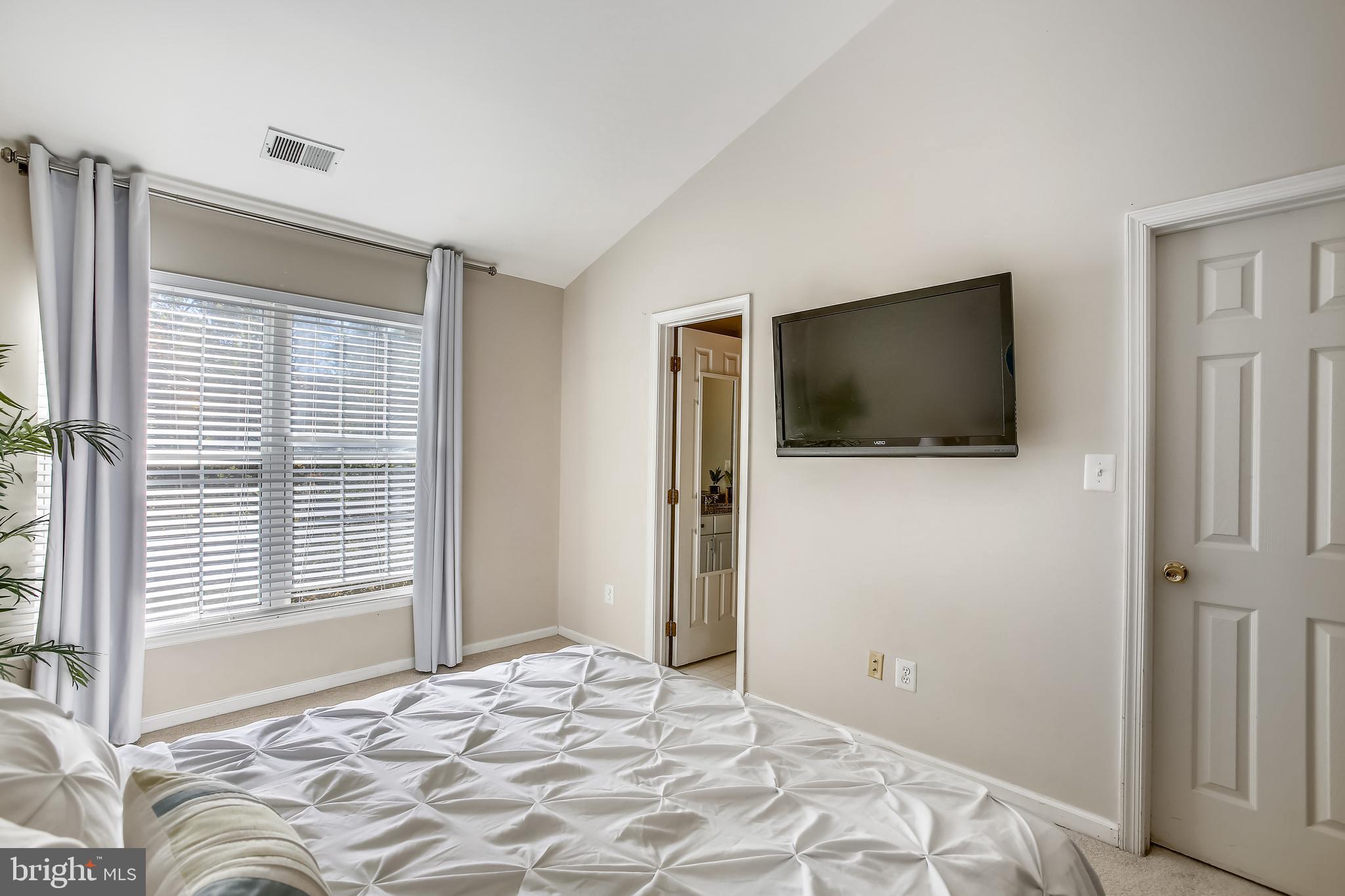 11489 Heritage Commons Way Reston, VA 20194 - Photo 21 of 54 Primary Bedroom Suite with View of Trees!
