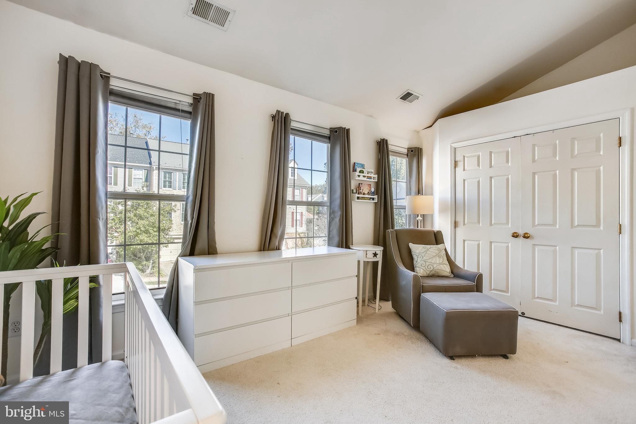11489 Heritage Commons Way Reston, VA 20194 - Photo 28 of 54 2nd Bedroom Suite - Plant Shelf over Closet