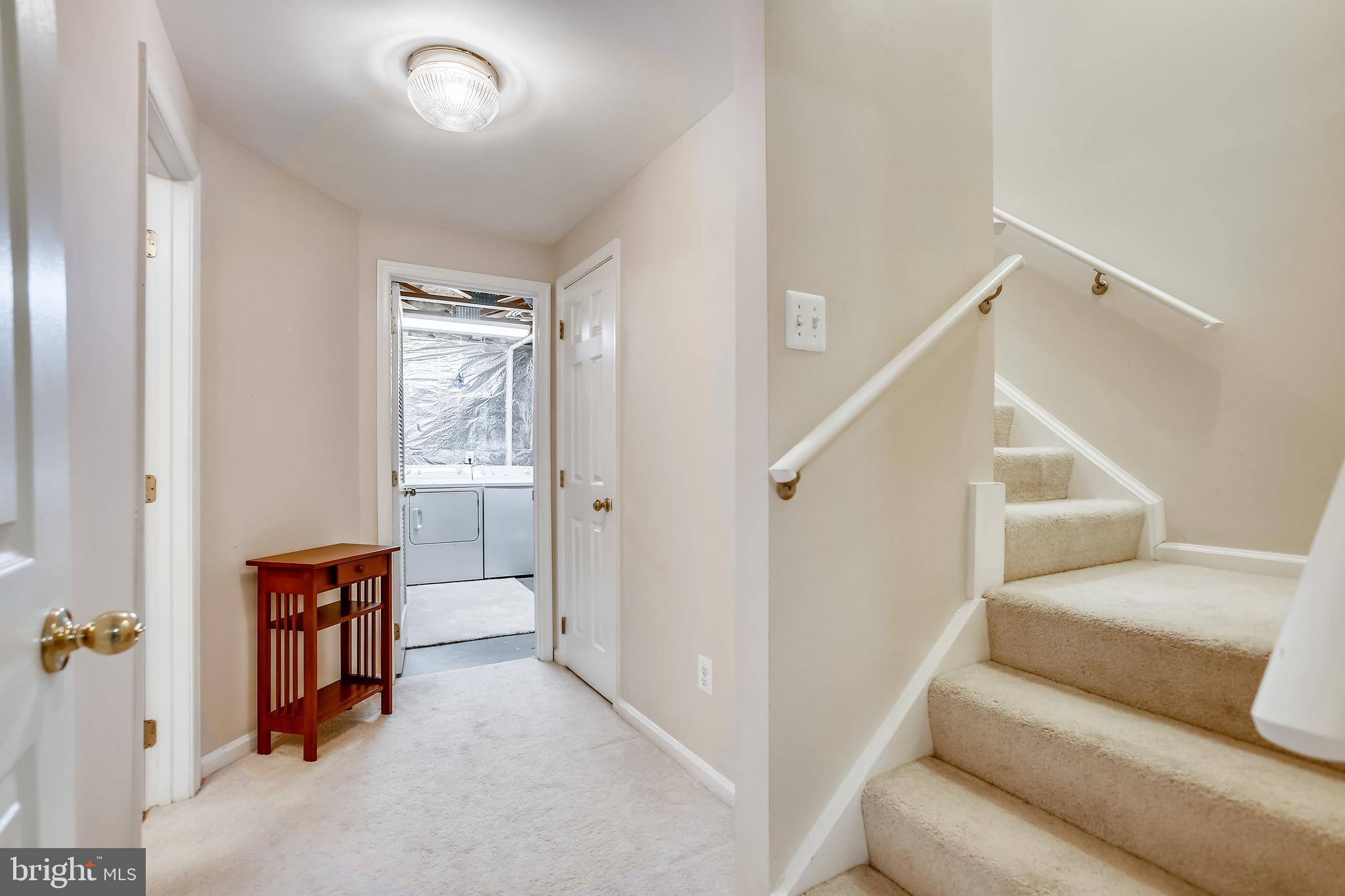 11489 Heritage Commons Way Reston, VA 20194 - Photo 32 of 54 Lower Level Hallway