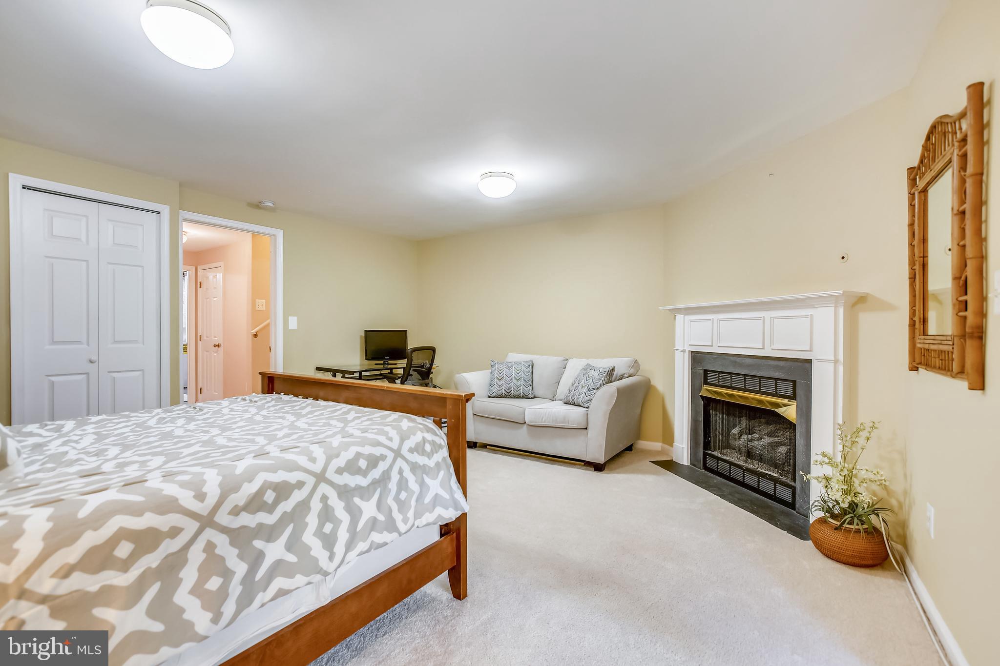 11489 Heritage Commons Way Reston, VA 20194 - Photo 35 of 54 Corner GAS FIREPLACE with Colonial Wood Mantle