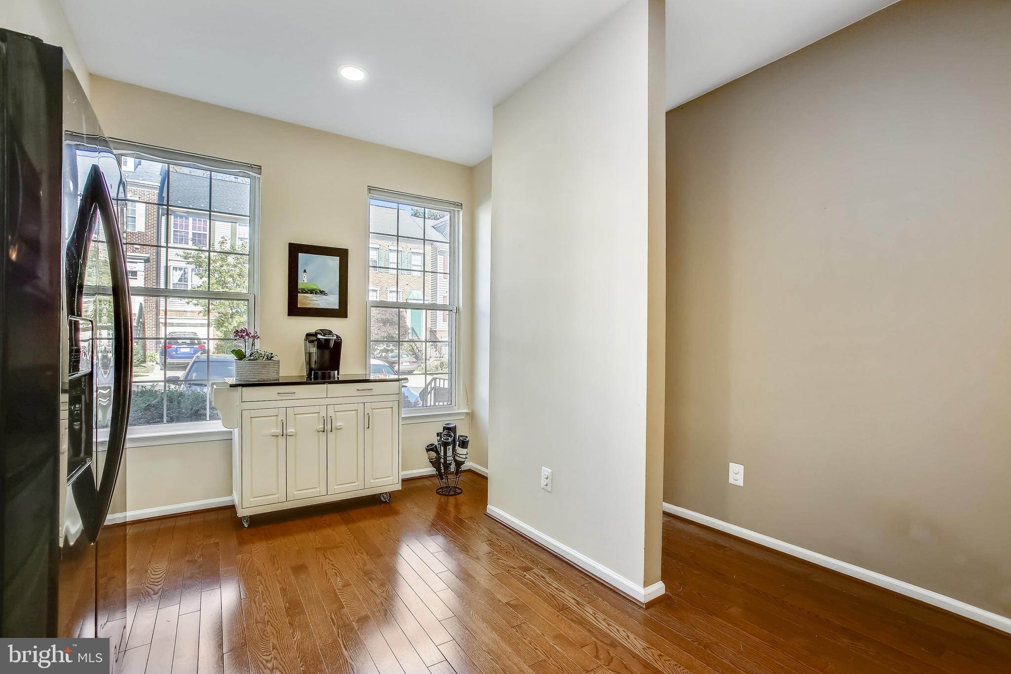 11489 Heritage Commons Way Reston, VA 20194 - Photo 6 of 54 Hardwood Flooring - Entryway , Kitchen, LRM & DRM