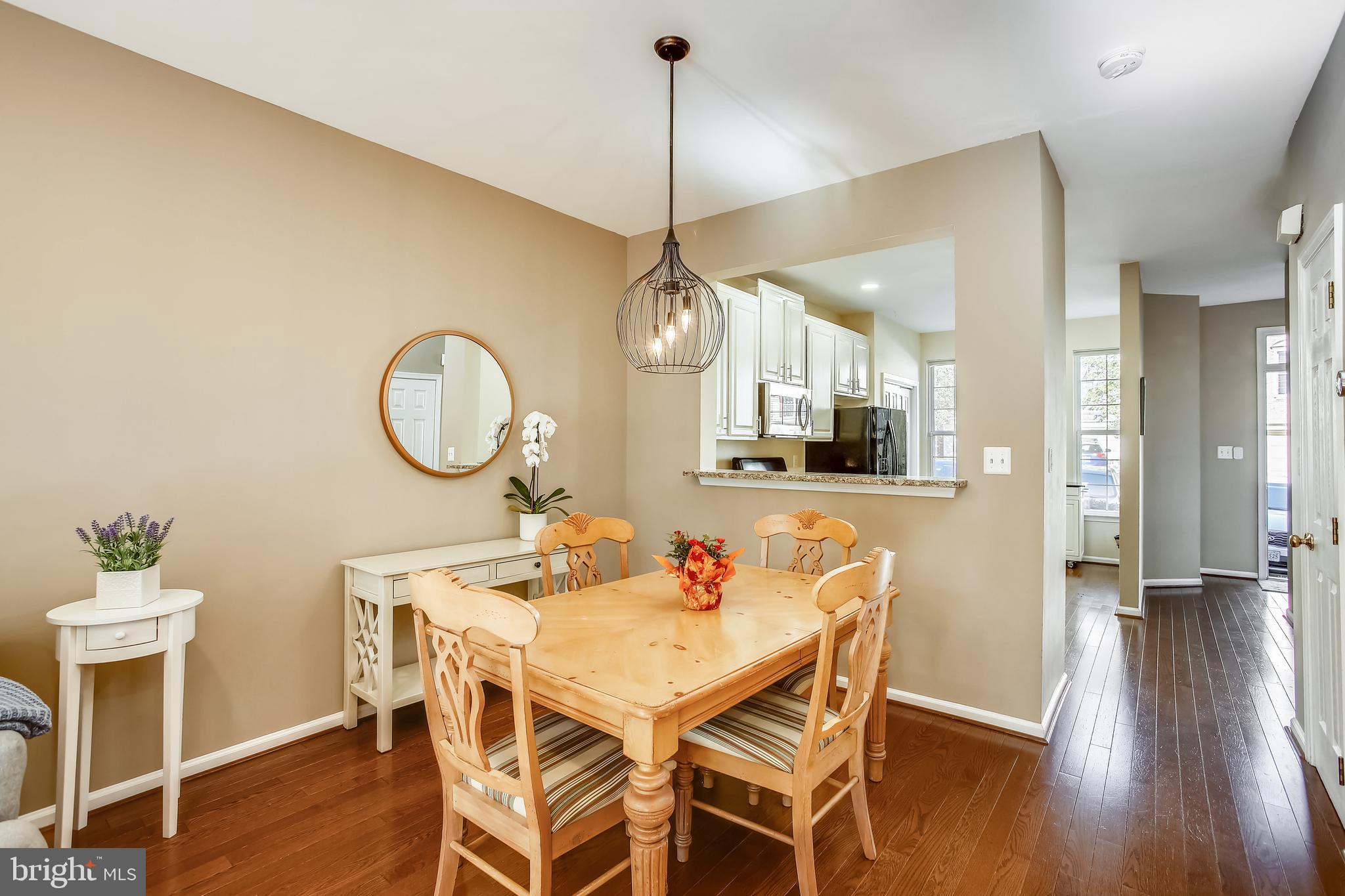 11489 Heritage Commons Way Reston, VA 20194 - Photo 8 of 54 Kitchen Pass-Through Opening to Dining Area