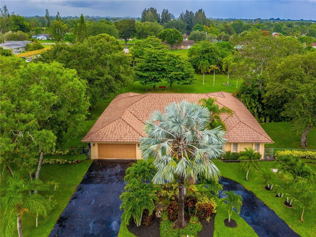 5520 Southwest 166th Avenue Southwest Ranches, FL 33331 - Photo 1 of 50 an aerial view of a house