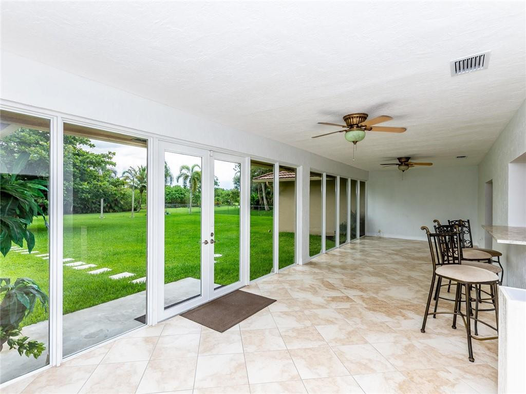 5520 Southwest 166th Avenue Southwest Ranches, FL 33331 - Photo 19 of 50 a view of an chairs and table in patio