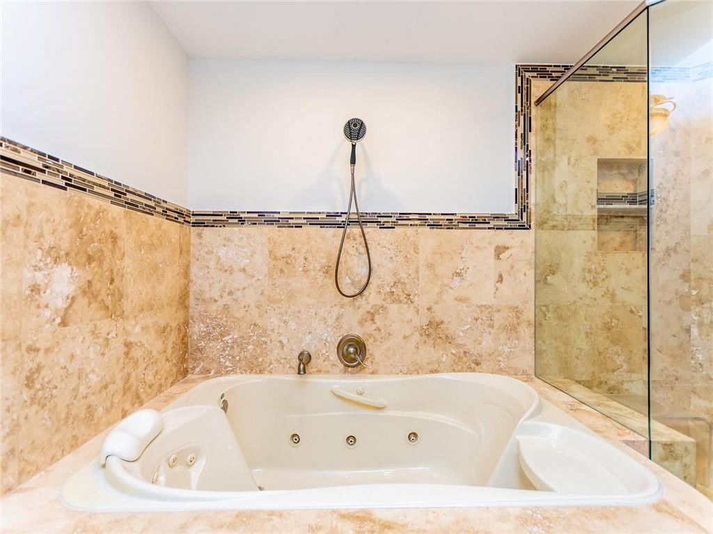 5520 Southwest 166th Avenue Southwest Ranches, FL 33331 - Photo 26 of 50 a bathroom with a tub and a shower
