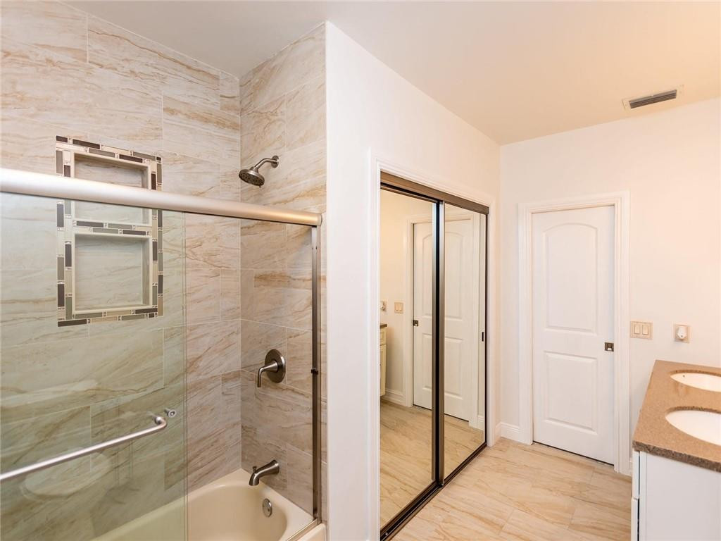 5520 Southwest 166th Avenue Southwest Ranches, FL 33331 - Photo 33 of 50 a bathroom with a shower and a sink