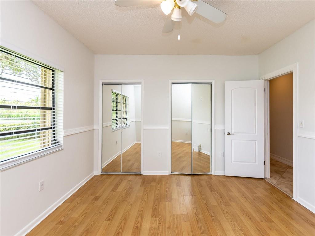 5520 Southwest 166th Avenue Southwest Ranches, FL 33331 - Photo 34 of 50 an empty room with wooden floor and windows