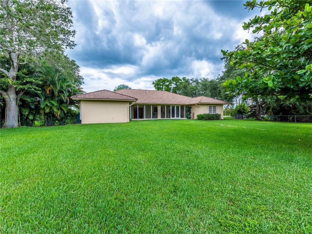 5520 Southwest 166th Avenue Southwest Ranches, FL 33331 - Photo 40 of 50 a view of a house with a yard