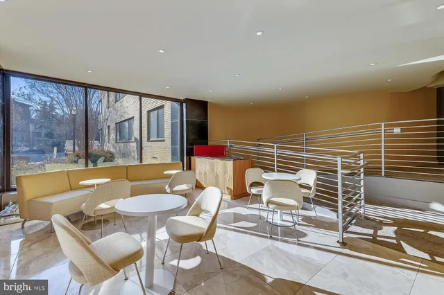 a outdoor space with patio furniture and wooden floor