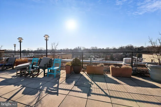 a view of a terrace with seating space