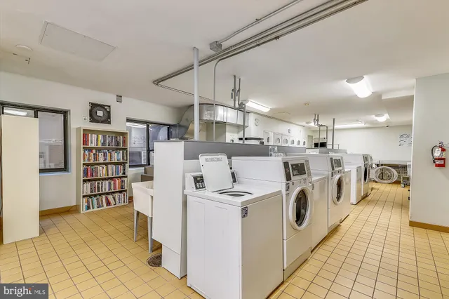 a view of a kitchen with appliances and cabinets