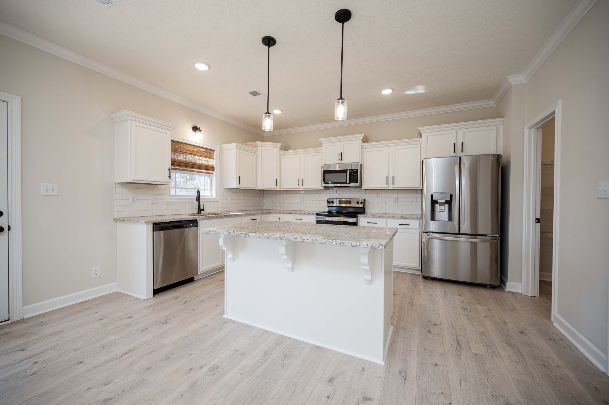 1600 Malone Way Clarksville, TN 37043 - Photo 13 of 39 a kitchen with stainless steel appliances a refrigerator sink and microwave