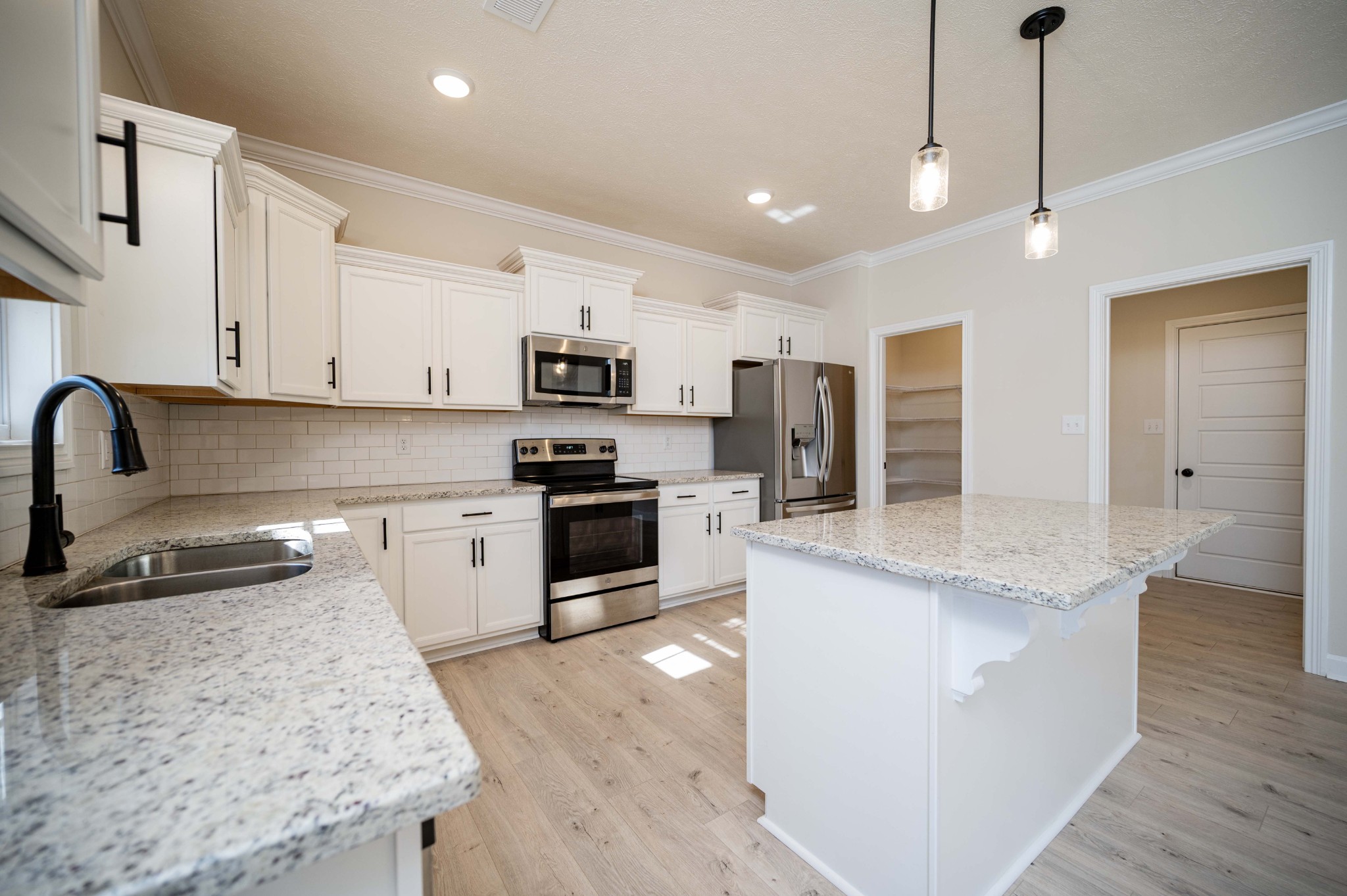 1600 Malone Way Clarksville, TN 37043 - Photo 18 of 39 a kitchen with stainless steel appliances granite countertop a sink stove and refrigerator