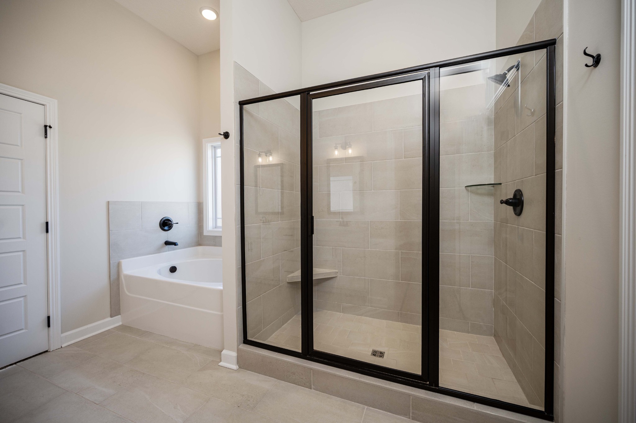 1600 Malone Way Clarksville, TN 37043 - Photo 28 of 39 a bathroom with a bathtub and a shower