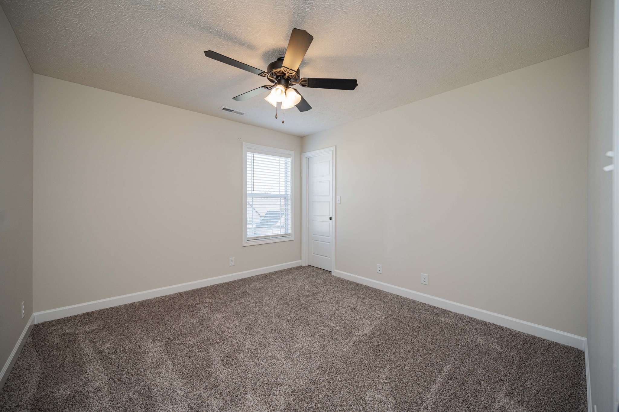 1600 Malone Way Clarksville, TN 37043 - Photo 33 of 39 an empty room with windows and fan