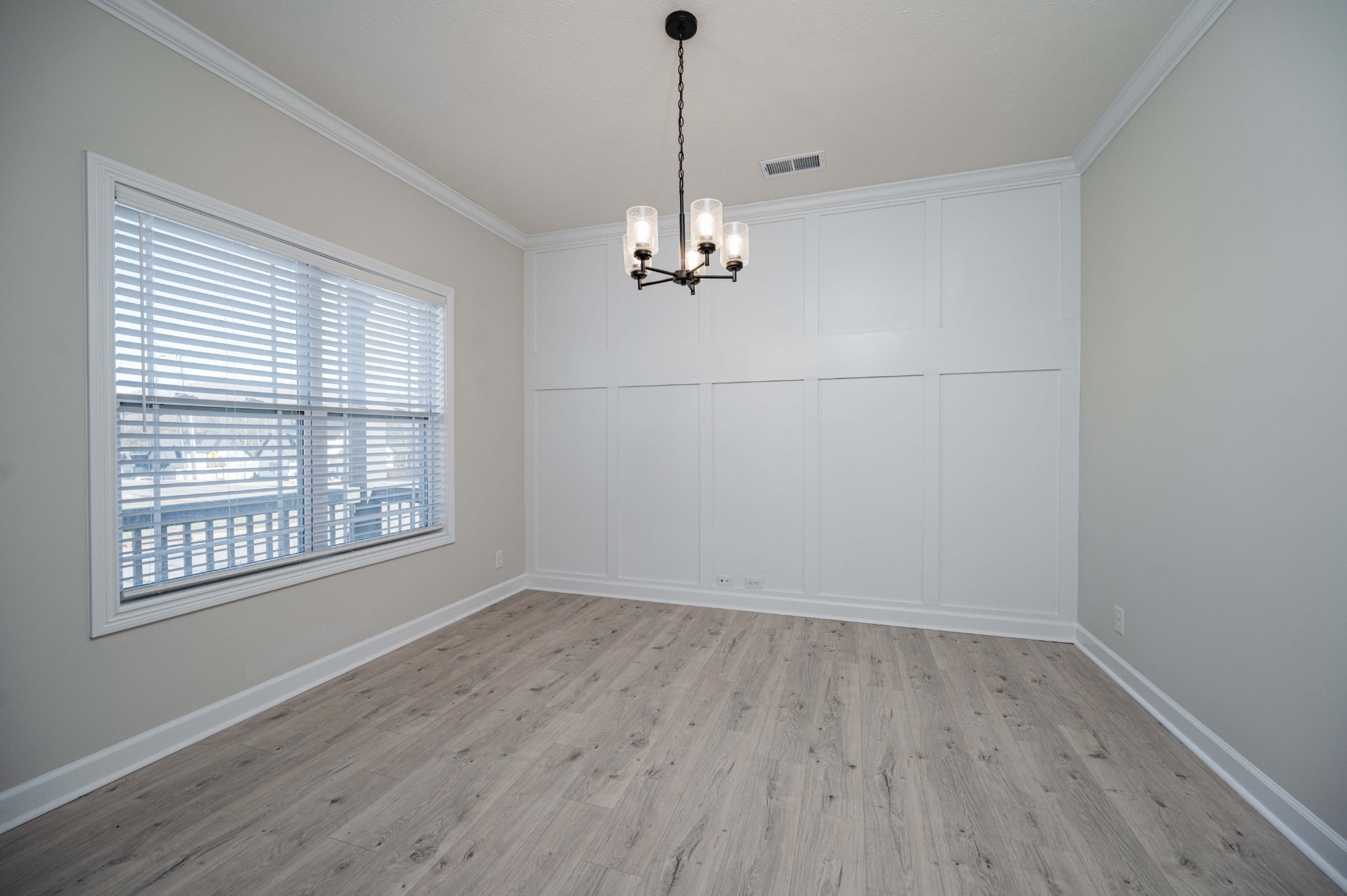 1600 Malone Way Clarksville, TN 37043 - Photo 5 of 39 wooden floor in an empty room with a window