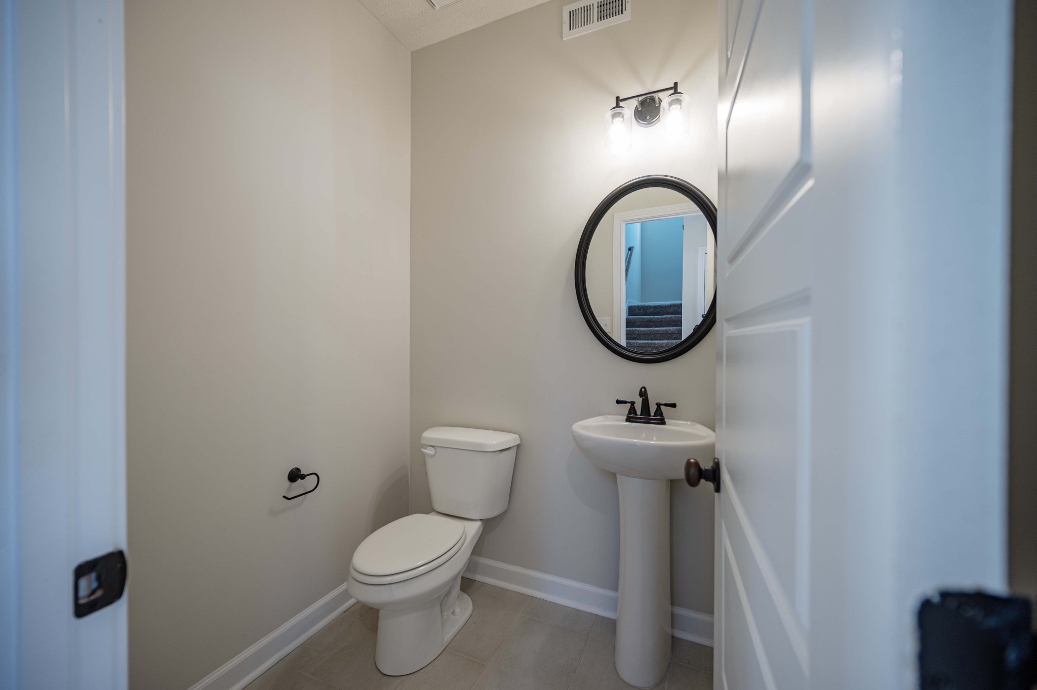 1600 Malone Way Clarksville, TN 37043 - Photo 6 of 39 a bathroom with a sink and a mirror