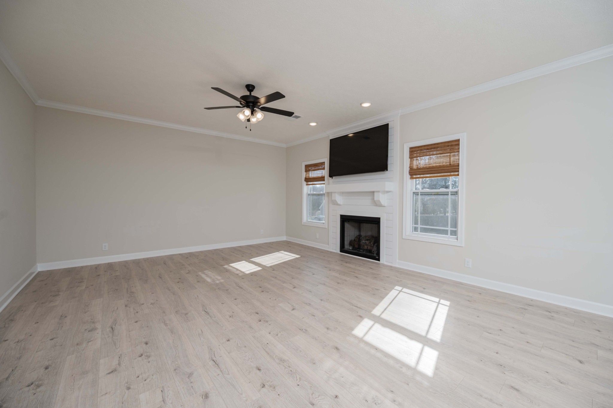 1600 Malone Way Clarksville, TN 37043 - Photo 7 of 39 a view of empty room with fireplace and wooden floor