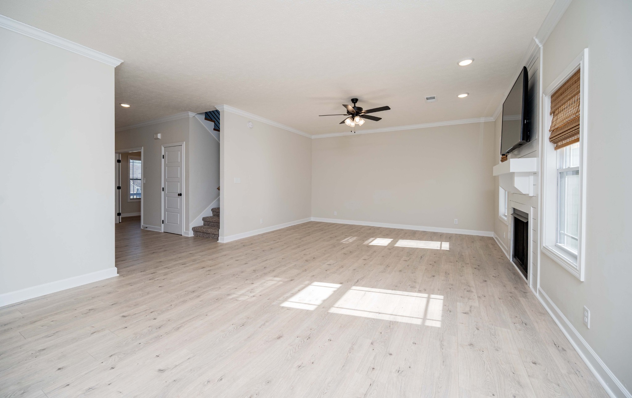 1600 Malone Way Clarksville, TN 37043 - Photo 9 of 39 a view of empty room with wooden floor and fan