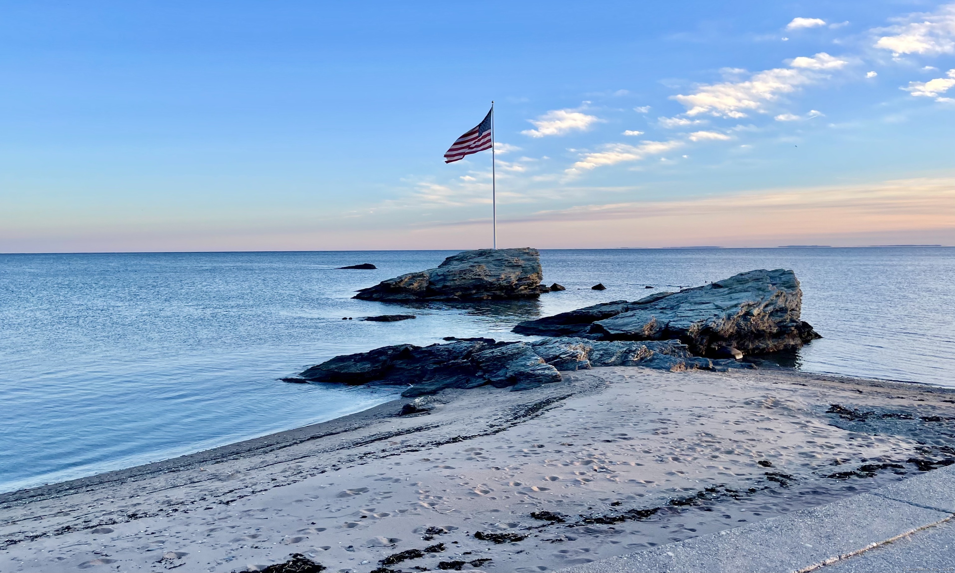 25 Village Road Milford, CT 06460 - Photo 27 of 27 a backyard of a house with lots of water view