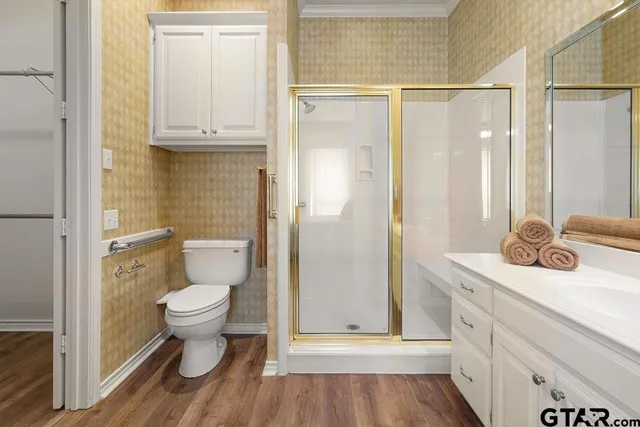 a bathroom with a sink vanity and a mirror
