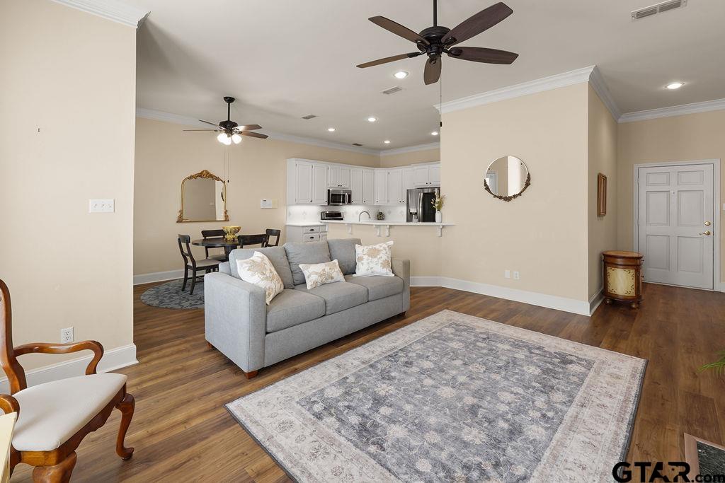 2210 Homestead Lane Tyler, TX 75701 - Photo 5 of 26 a living room with furniture and wooden floor