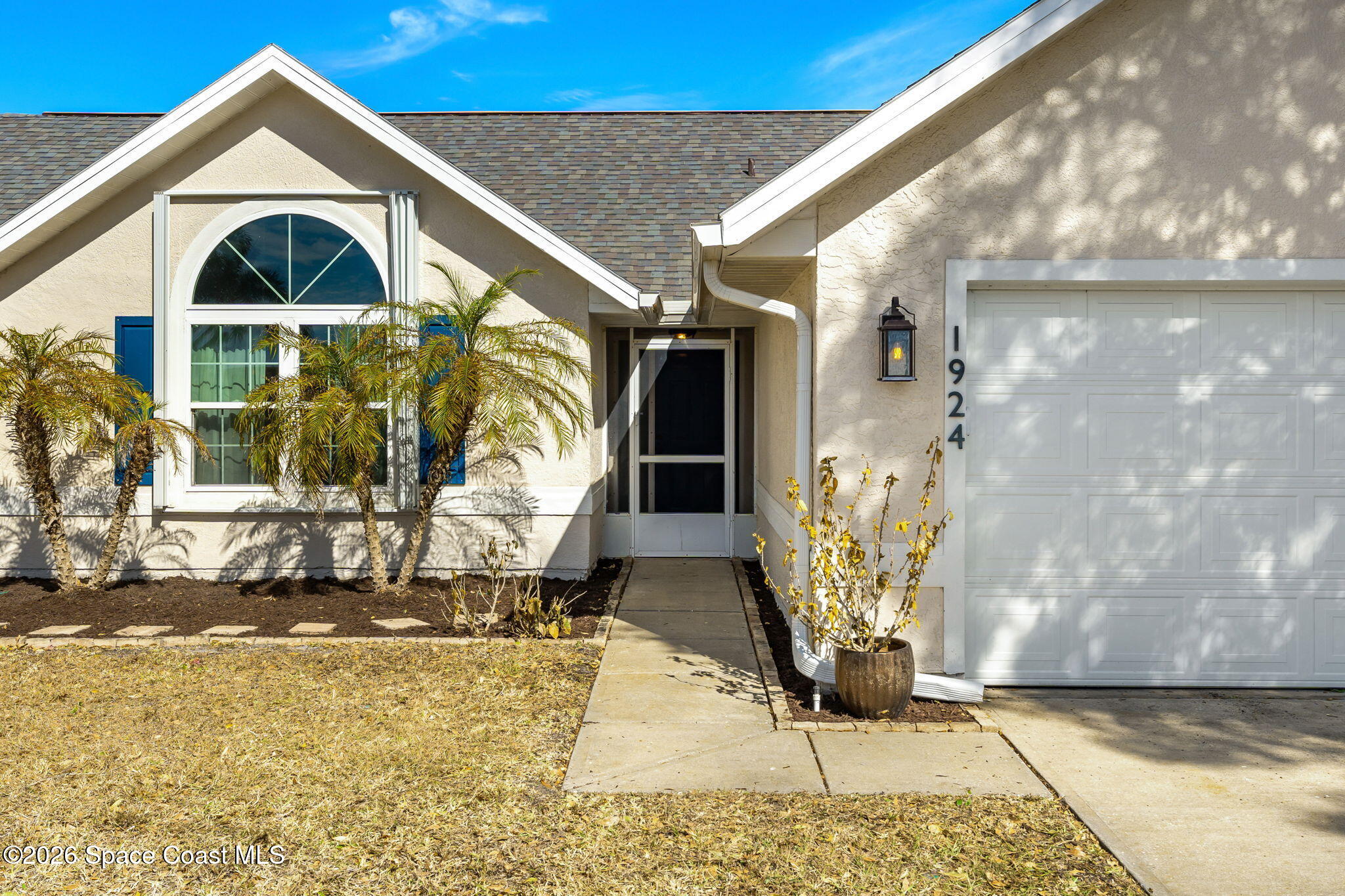 1924 Fabien Circle Melbourne, FL 32940 - Photo 2 of 35 a house view with a outdoor space