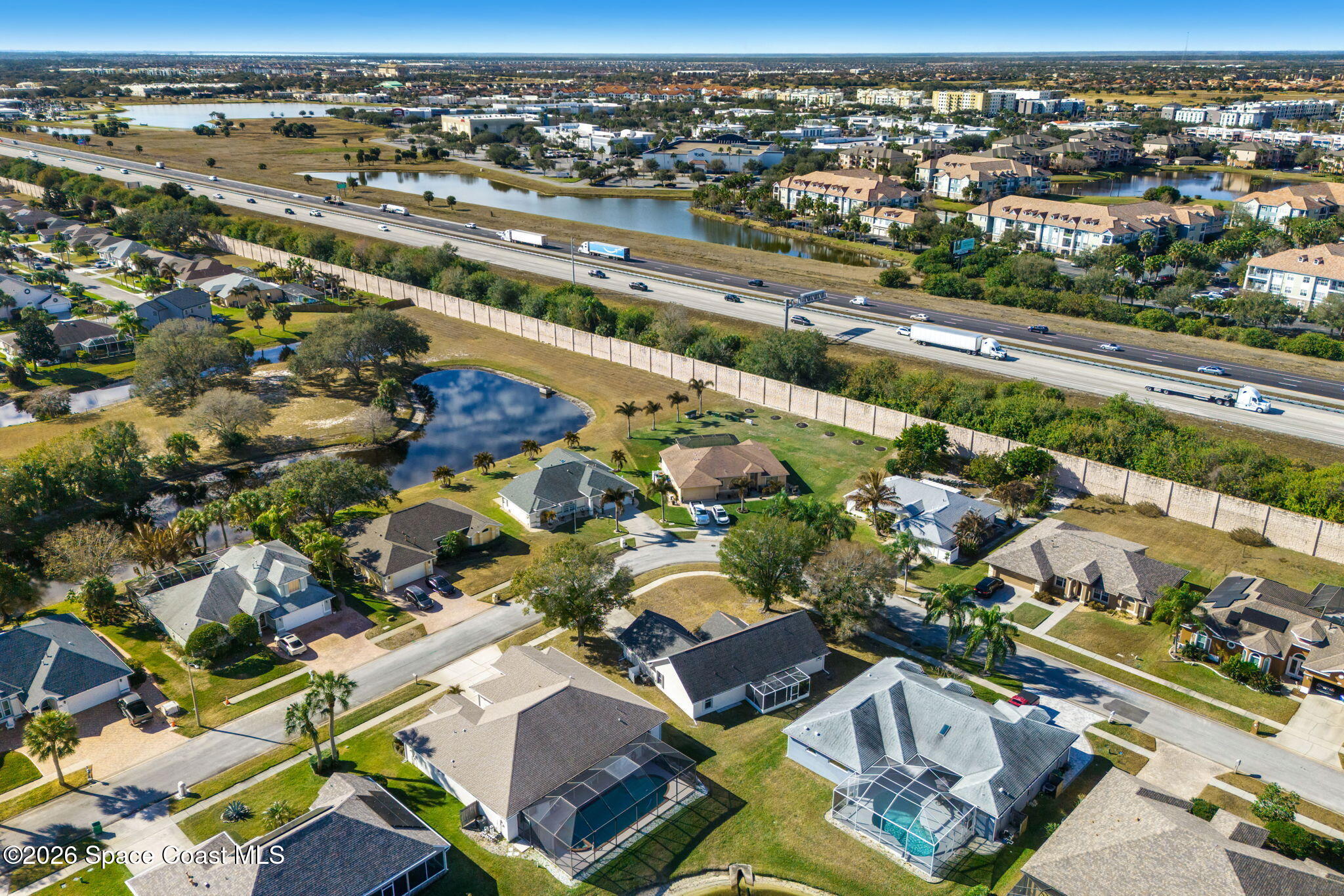 1924 Fabien Circle Melbourne, FL 32940 - Photo 31 of 35 an aerial view of residential houses with outdoor space
