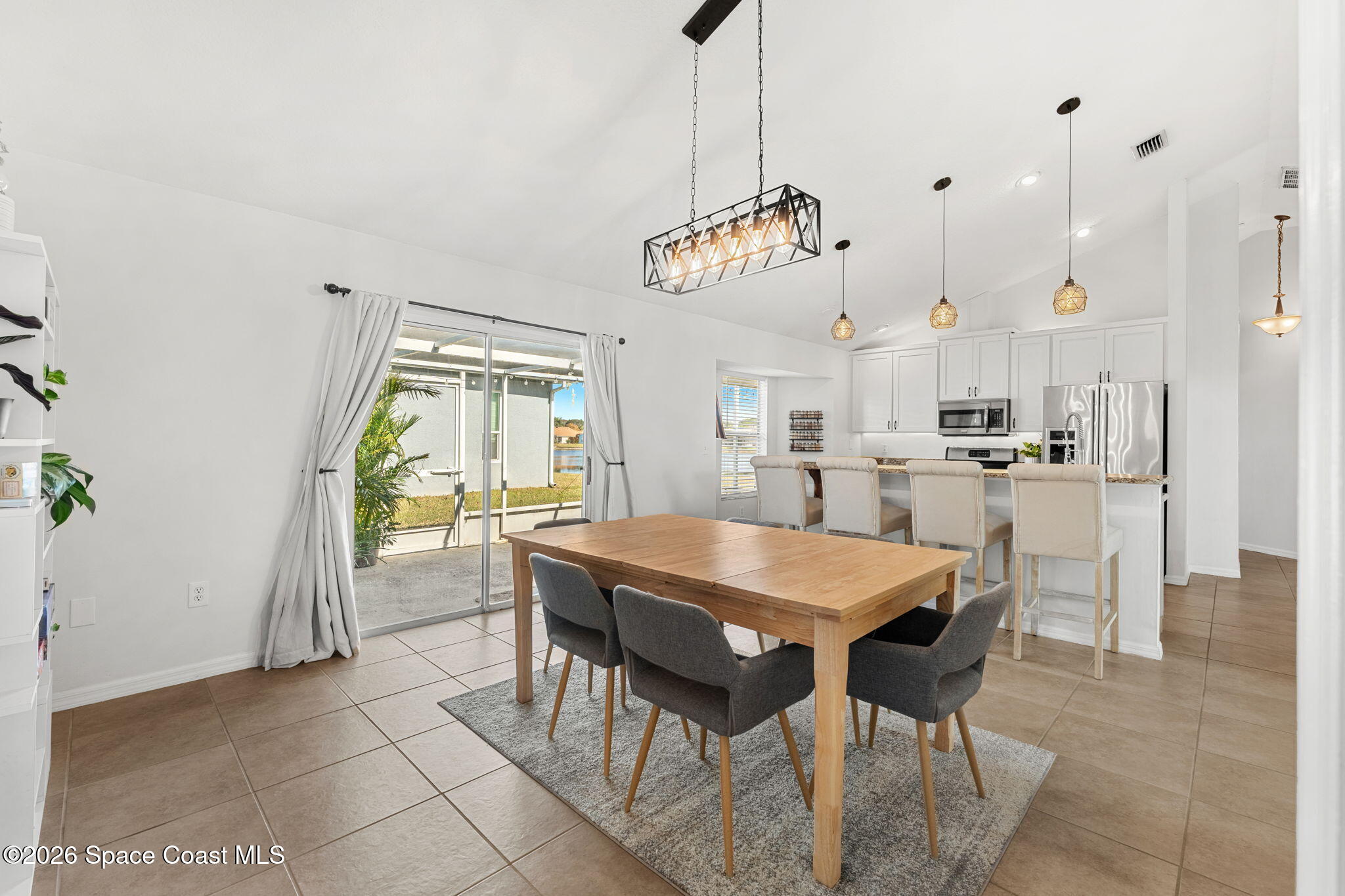 1924 Fabien Circle Melbourne, FL 32940 - Photo 9 of 35 a view of a dining room with furniture
