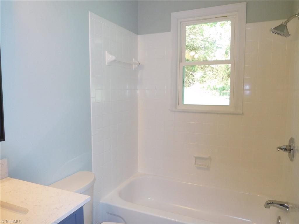 6454 Germanton Road Rural Hall, NC 27045 - Photo 24 of 28 Tiled Surround for Tub/shower in Hall Bath.