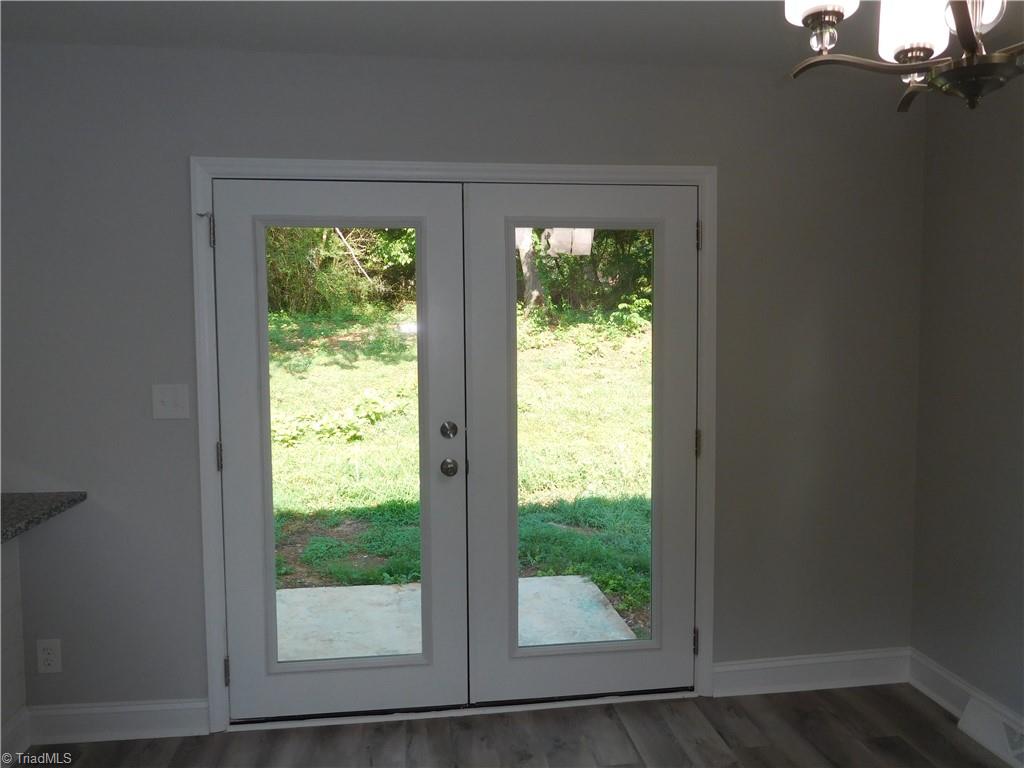 6454 Germanton Road Rural Hall, NC 27045 - Photo 7 of 28 Doors in DR lead out to patio - perfect for grilling on.