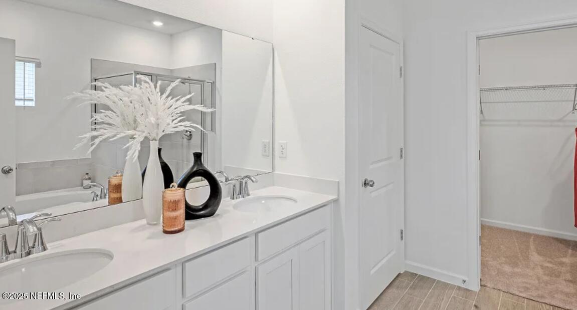 3125 Adelaide Road Green Cove Springs, FL 32043 - Photo 42 of 47 a bathroom with a double vanity sink and