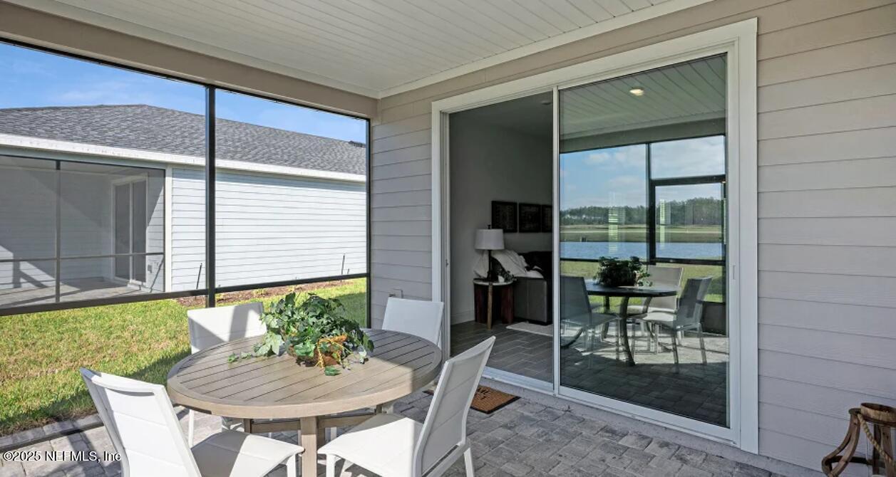 3125 Adelaide Road Green Cove Springs, FL 32043 - Photo 44 of 47 a view of a dining room with furniture window and outside view
