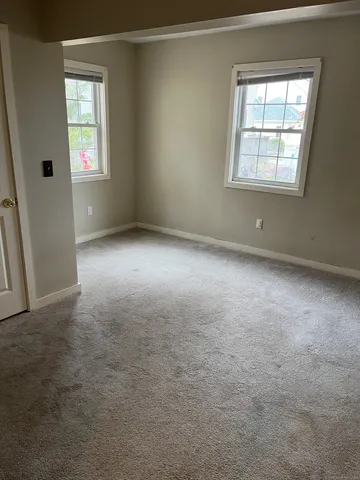 an empty room with a door