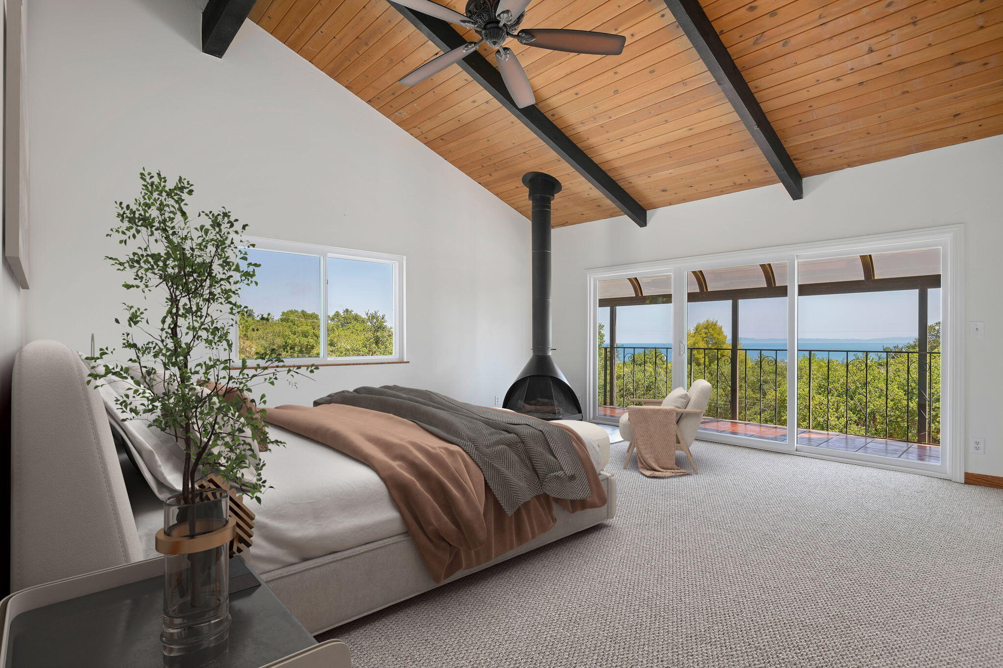 2106 Mt Calvary Road Santa Barbara, CA 93105 - Photo 24 of 66 a bed sitting in a bedroom next to a balcony