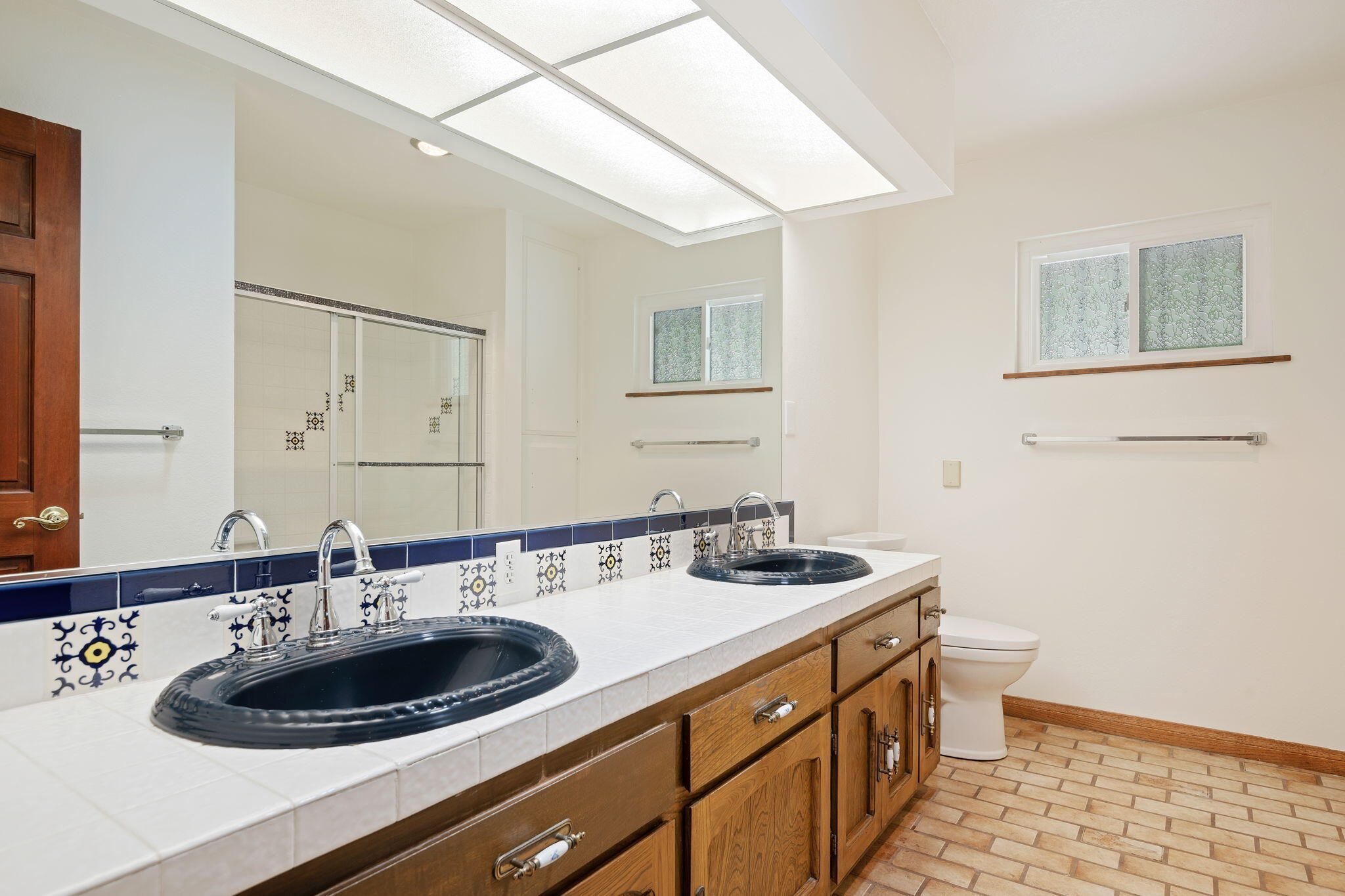 2106 Mt Calvary Road Santa Barbara, CA 93105 - Photo 35 of 66 a bathroom with a sink and a mirror