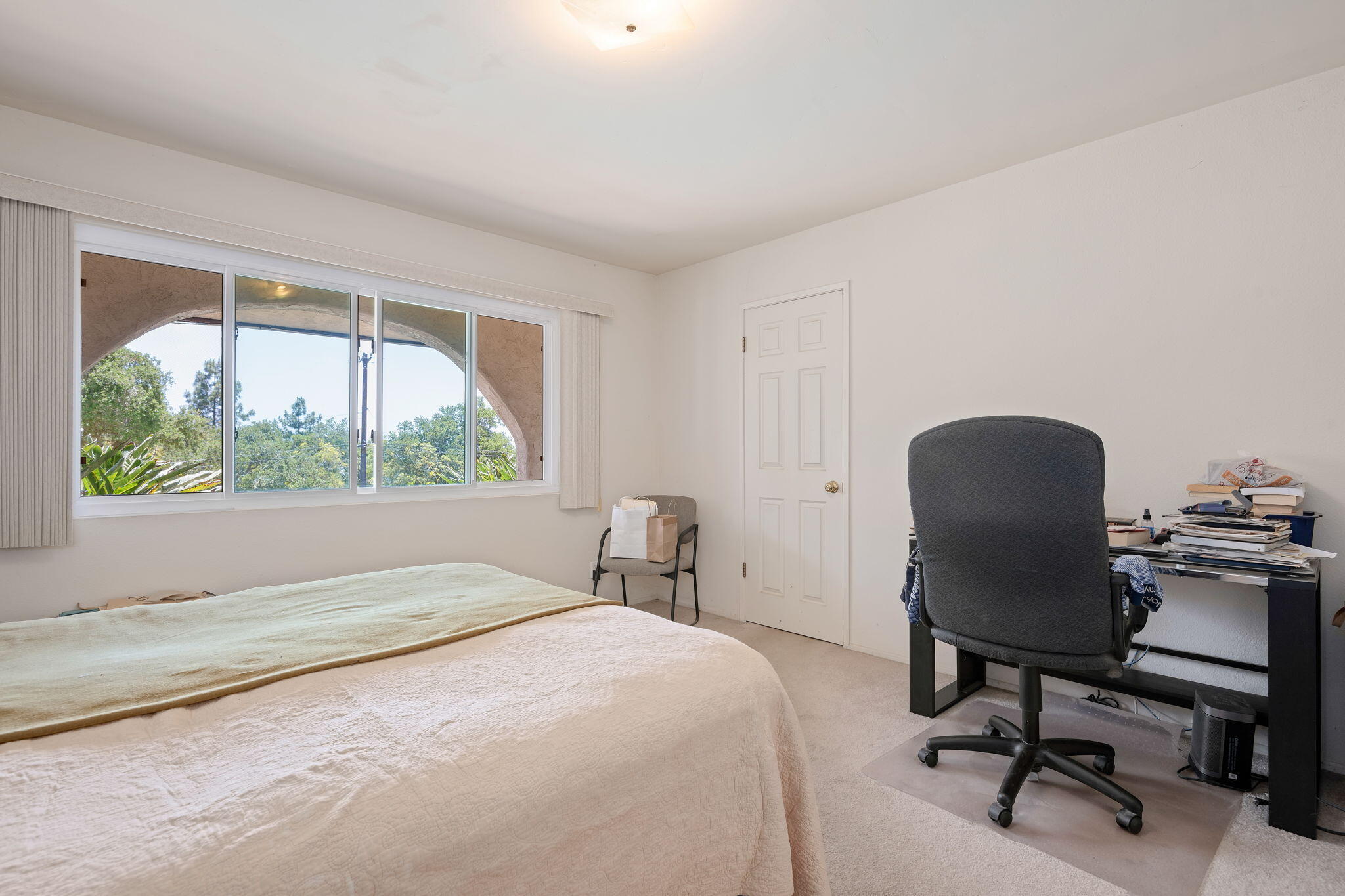 2106 Mt Calvary Road Santa Barbara, CA 93105 - Photo 46 of 66 a bedroom with a large window and a desk