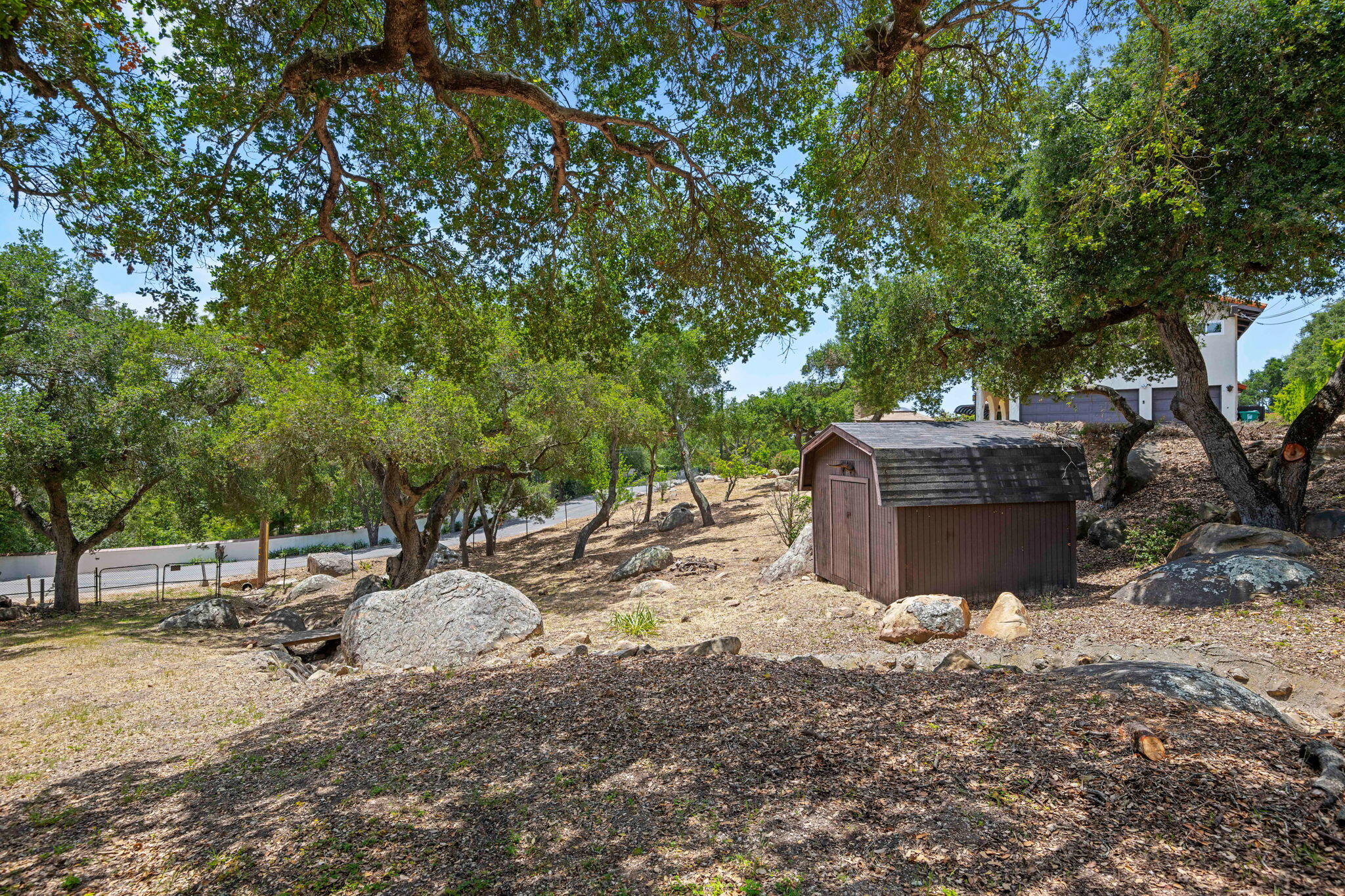 2106 Mt Calvary Road Santa Barbara, CA 93105 - Photo 60 of 66 a view of a backyard with table and chairs