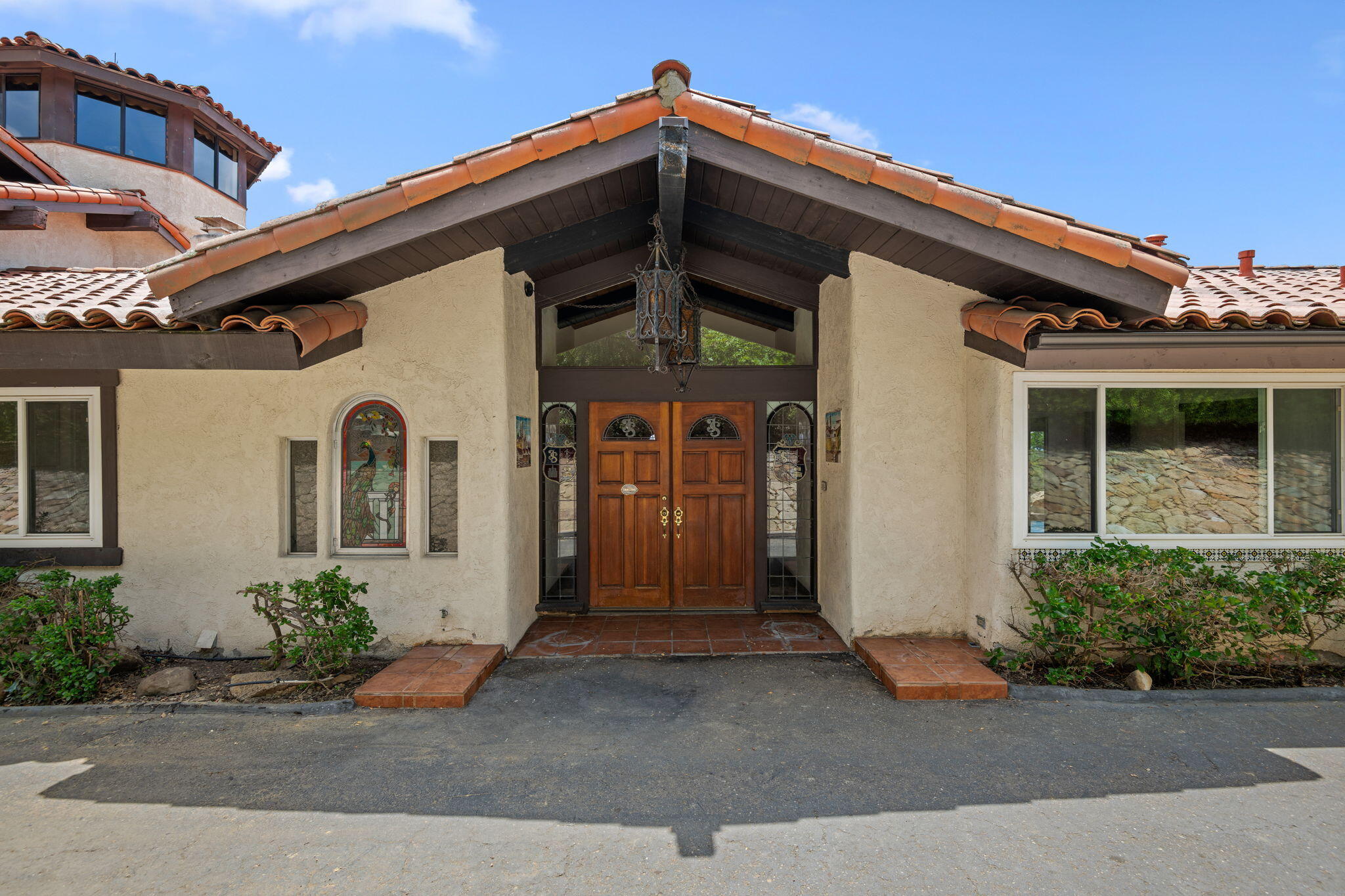 2106 Mt Calvary Road Santa Barbara, CA 93105 - Photo 6 of 66 a front view of a house with garage