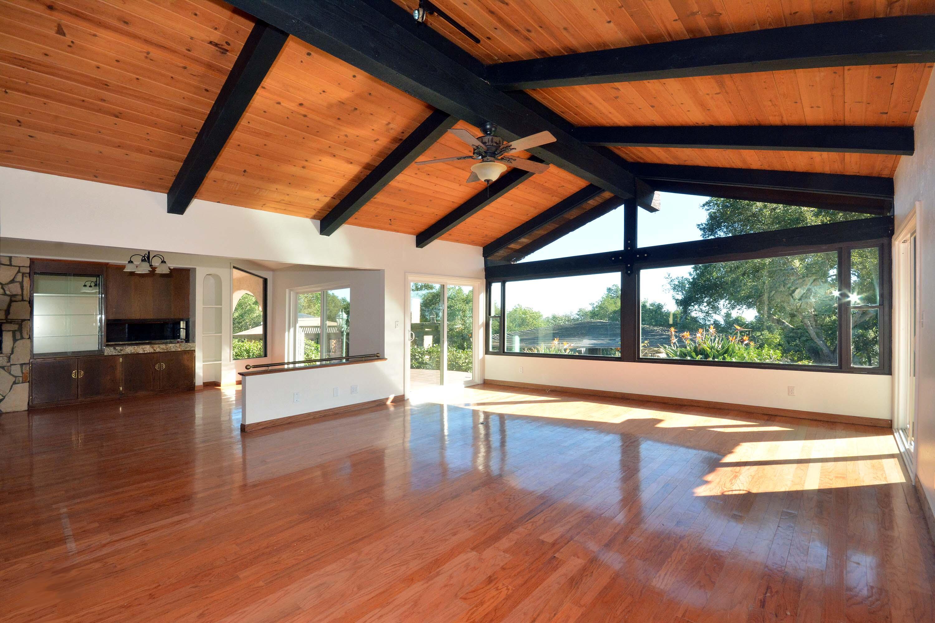 2106 Mt Calvary Road Santa Barbara, CA 93105 - Photo 10 of 66 a view of empty room with wooden floor and windows