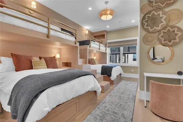 a bedroom with bed and window