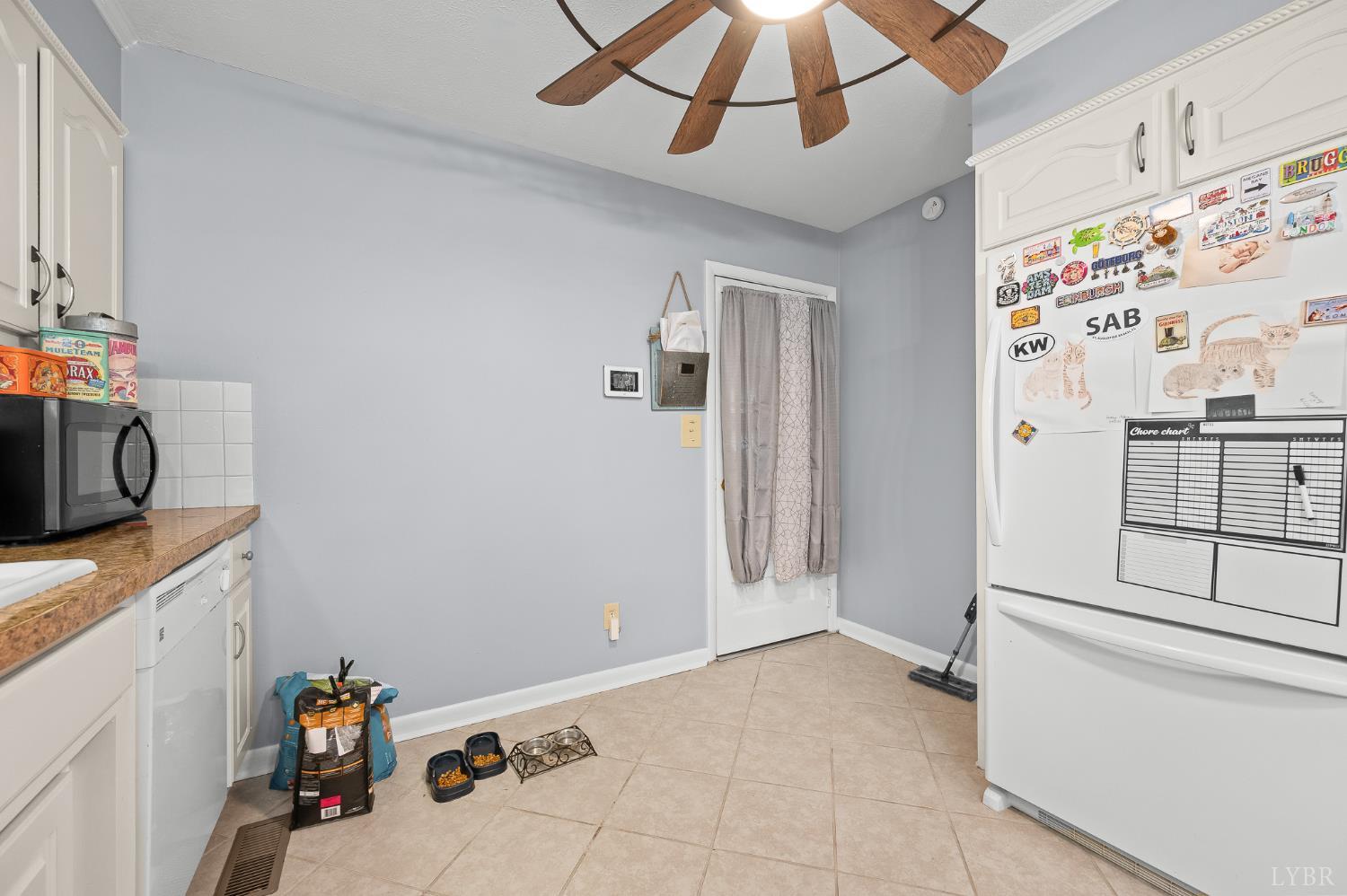 969 Hawkins Road Evington, VA 24550 - Photo 13 of 40 Opposite the kitchen sink. this is the door to the Sunroom