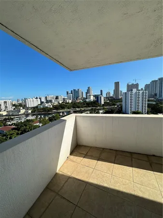 a view of a terrace with city view