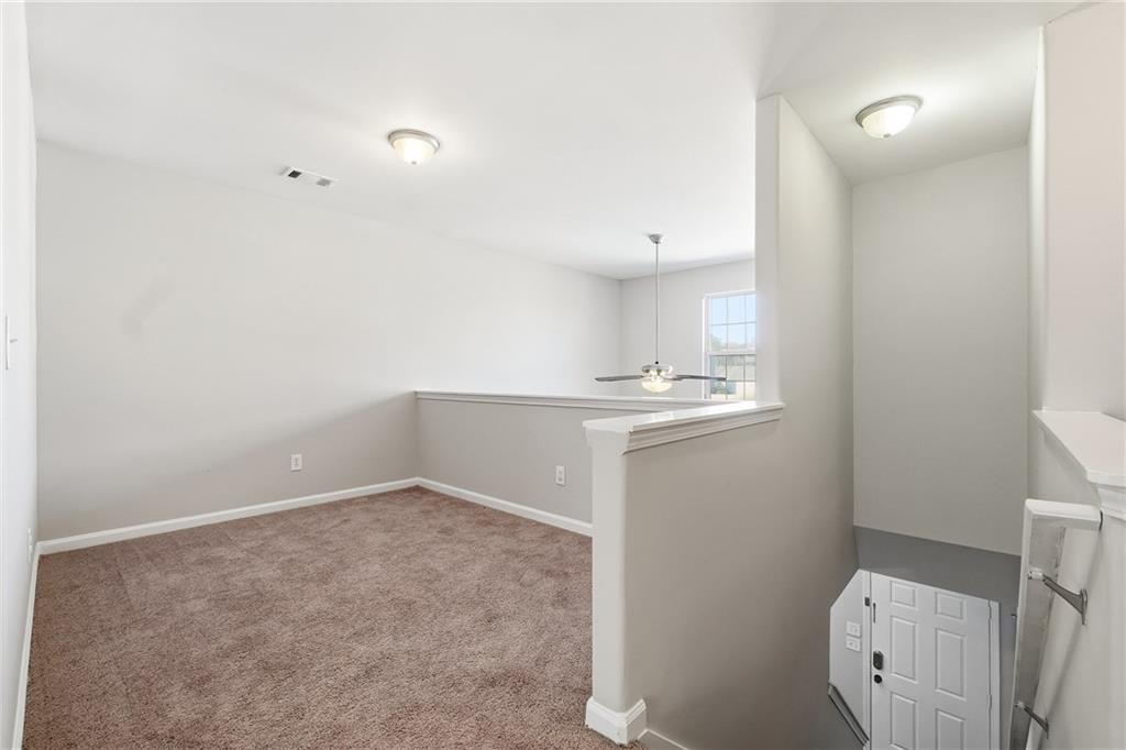 1468 Box Circle Winder, GA 30680 - Photo 16 of 25 a bathroom with a sink a toilet and a mirror