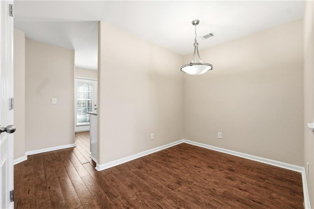 1468 Box Circle Winder, GA 30680 - Photo 7 of 25 a view of a room with wooden floor and windows