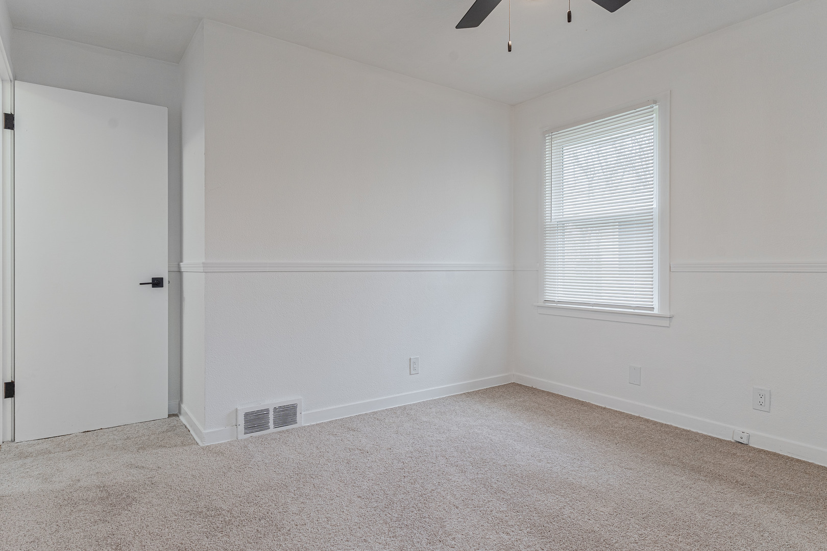 15324 South Corbin Street Plainfield, IL 60544 - Photo 11 of 26 an empty room with a window