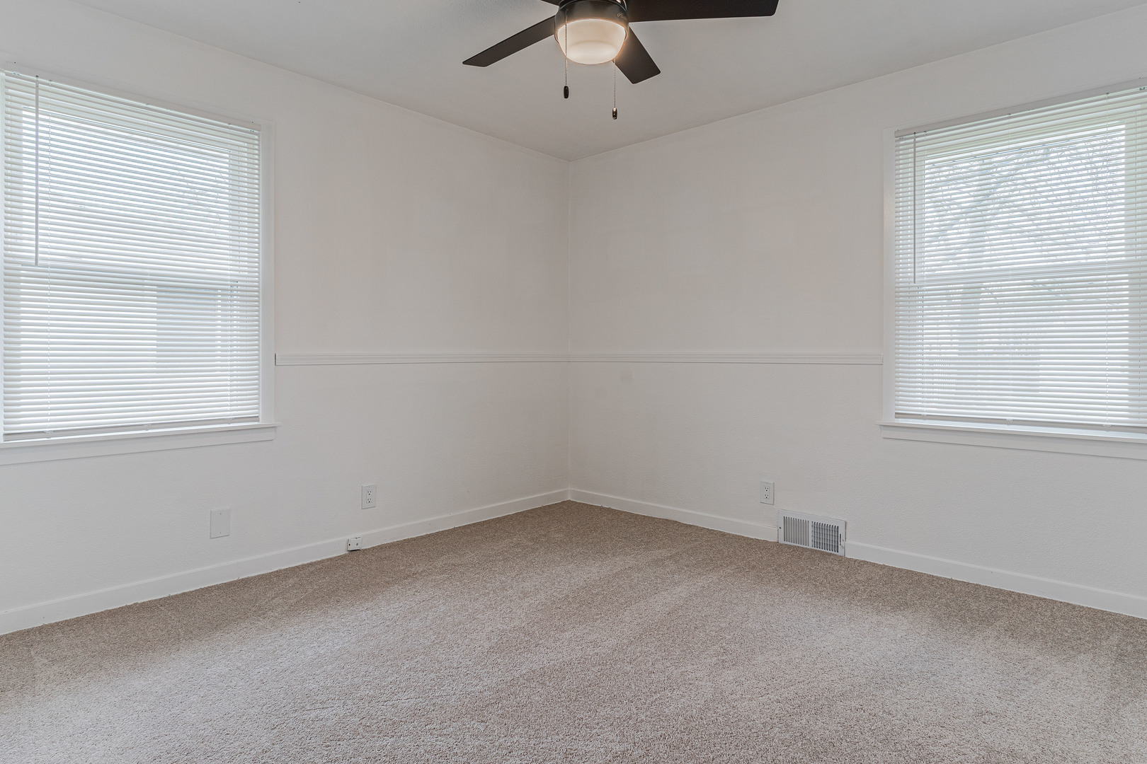 15324 South Corbin Street Plainfield, IL 60544 - Photo 10 of 26 an empty room with a window