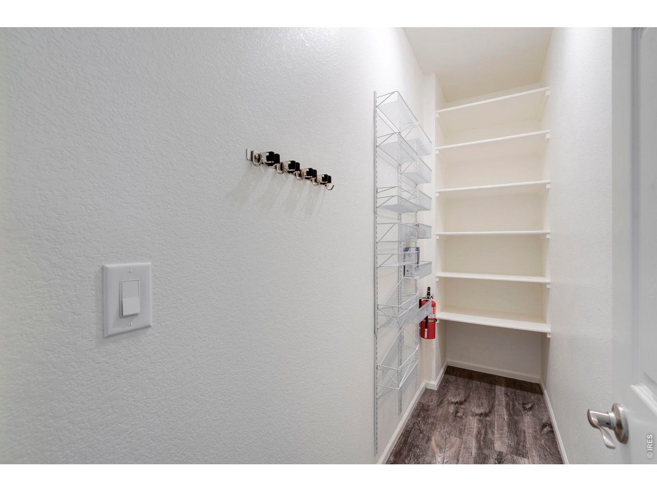 10080 Cedar Street Firestone, CO 80504 - Photo 17 of 38 Come in through the garage and put your Costco stash in the secondary pantry/closet